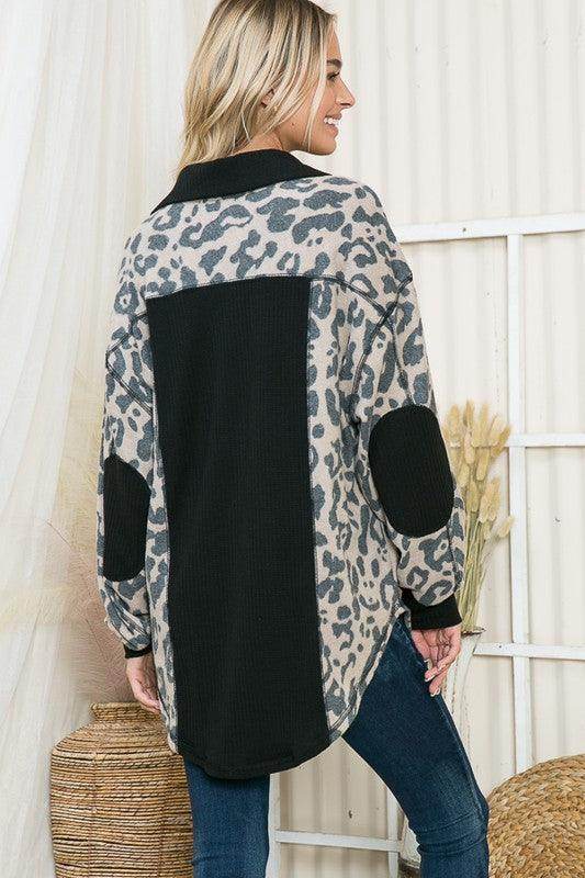 Women's elbow patch shacket shirt in leopard print with stylish black accents and relaxed fit