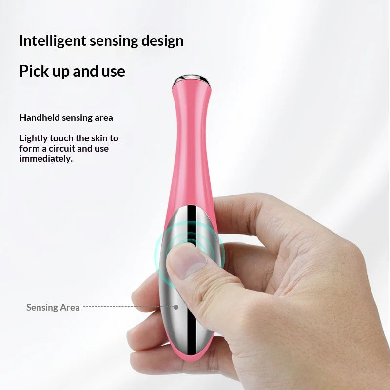 Pink handheld electric eye massager for puffiness with intelligent sensing design