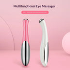 Pink and white electric eye massager for puffiness, designed for soothing eye relief