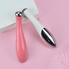 Electric eye massager for puffiness, pink and white design, soothing treatment