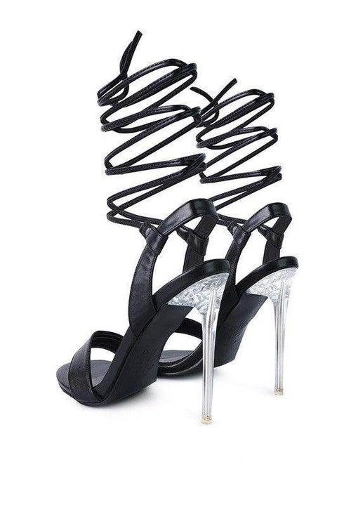 Women's elegant clear heel shoes with black straps and stylish high design for chic occasions