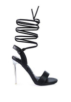 Stylish black elegant clear heel shoes with wrap-around ankle straps for chic occasions
