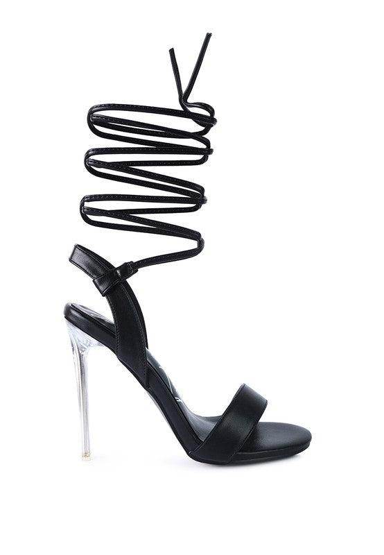 Stylish black elegant clear heel shoes with wrap-around ankle straps for chic occasions