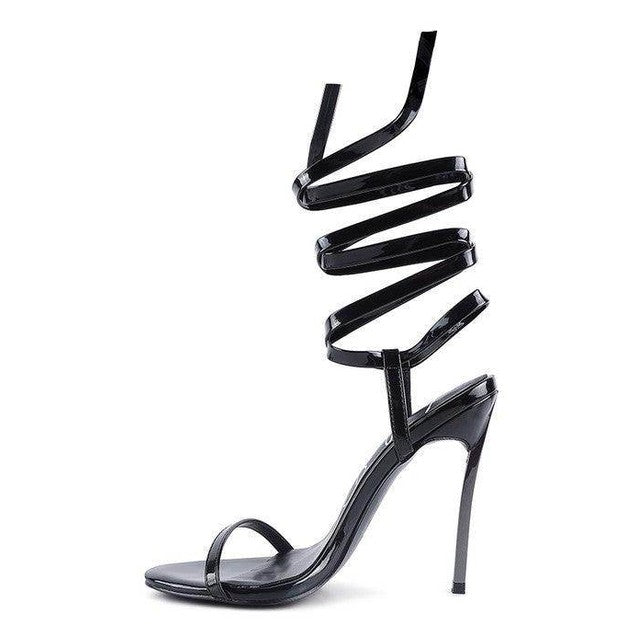 Stylish black elegant lace up heels with a high stiletto heel and ankle straps