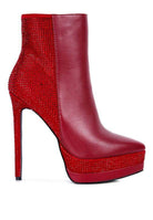 Red high-heeled ankle boots by Rag Company, perfect as elegant vacation footwear