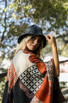 Leto Accessories Ethical Fashion Bucket Hat styled with a patterned wrap in natural outdoor setting