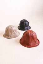 Leto Accessories ethical fashion bucket hat in three colors: beige, black, and rust for stylish outdoor wear