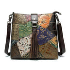 VacationGrabs ethnic patchwork handbag featuring vibrant colors and intricate leather detailing