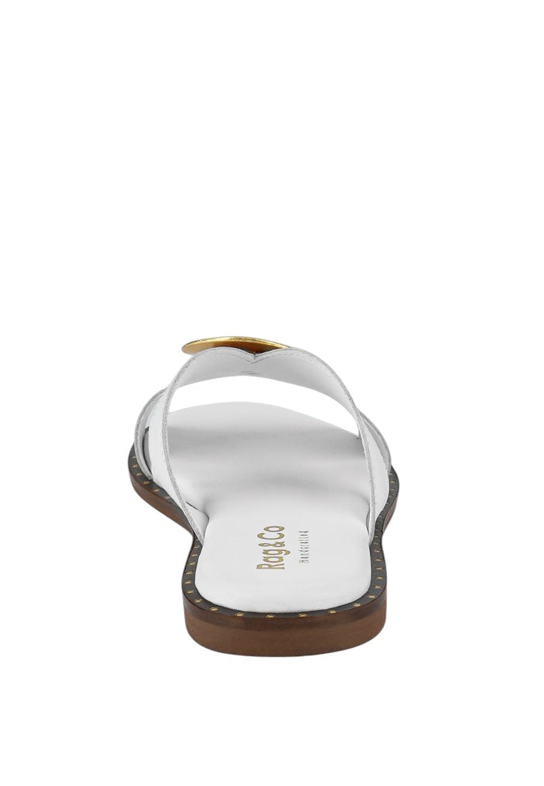 Mules plates ornées de boucles Eudora