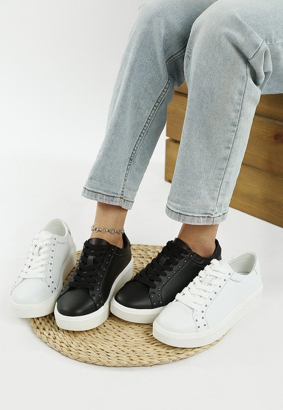 Women's embellished chunky sneakers in black and white for stylish casual wear