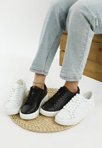 Women's embellished chunky sneakers in black and white for stylish casual wear
