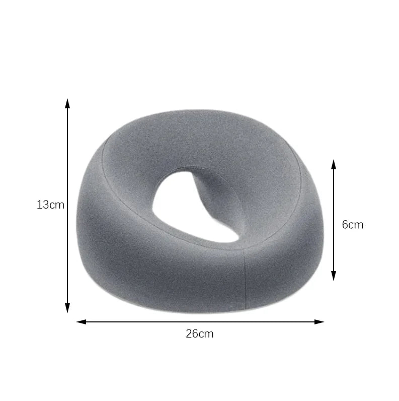 Gray face down pillow for massage with ergonomic design and comfort