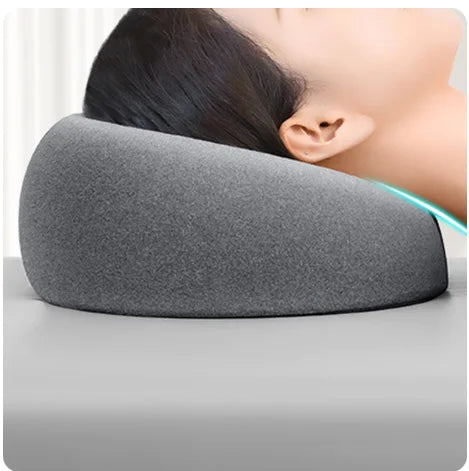 Gray face down pillow for massage offering comfort during treatments