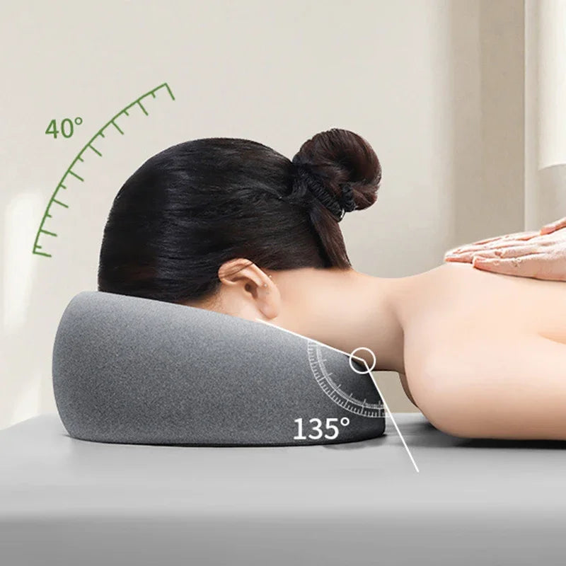 Gray face down pillow for massage, ergonomic support for relaxation