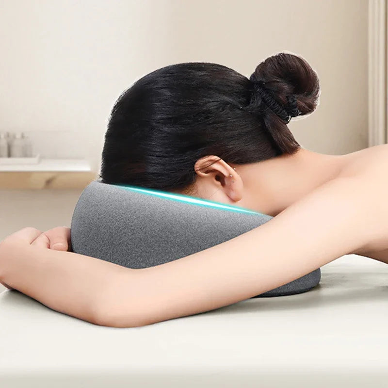 Gray face down pillow for massage, ergonomic design for comfort
