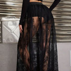 Black sheer lace skirt with shorts worn by model showing intricate floral lace design
