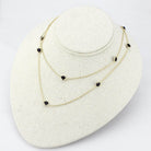 Two-layered gold necklace with garnet CZ fashion necklace stones, perfect for stylish occasions