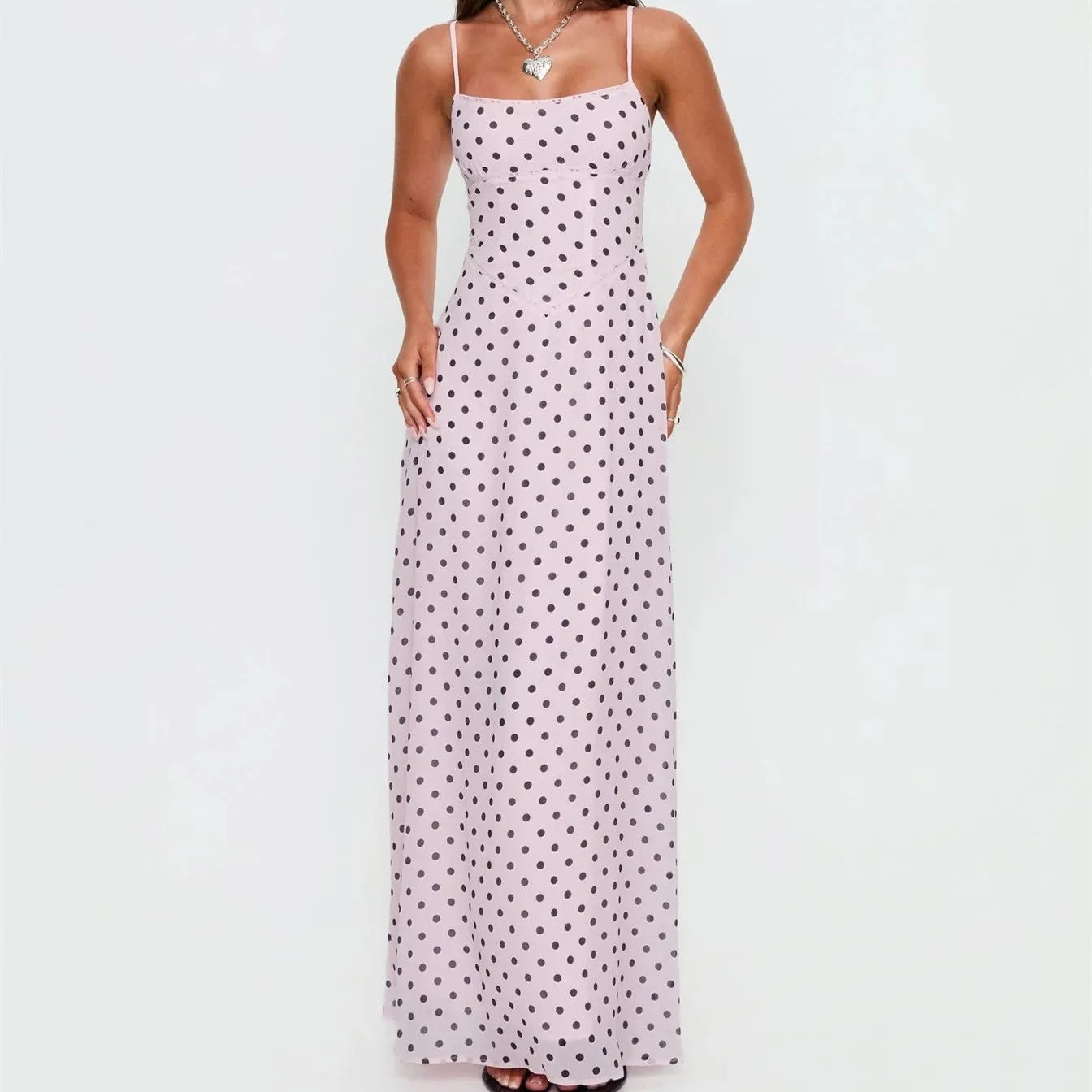 Women's pink polka dot maxi dress, perfect for summer gatherings