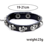 Men's fashion punk rivet bracelets in black leather featuring skull accents for a bold style