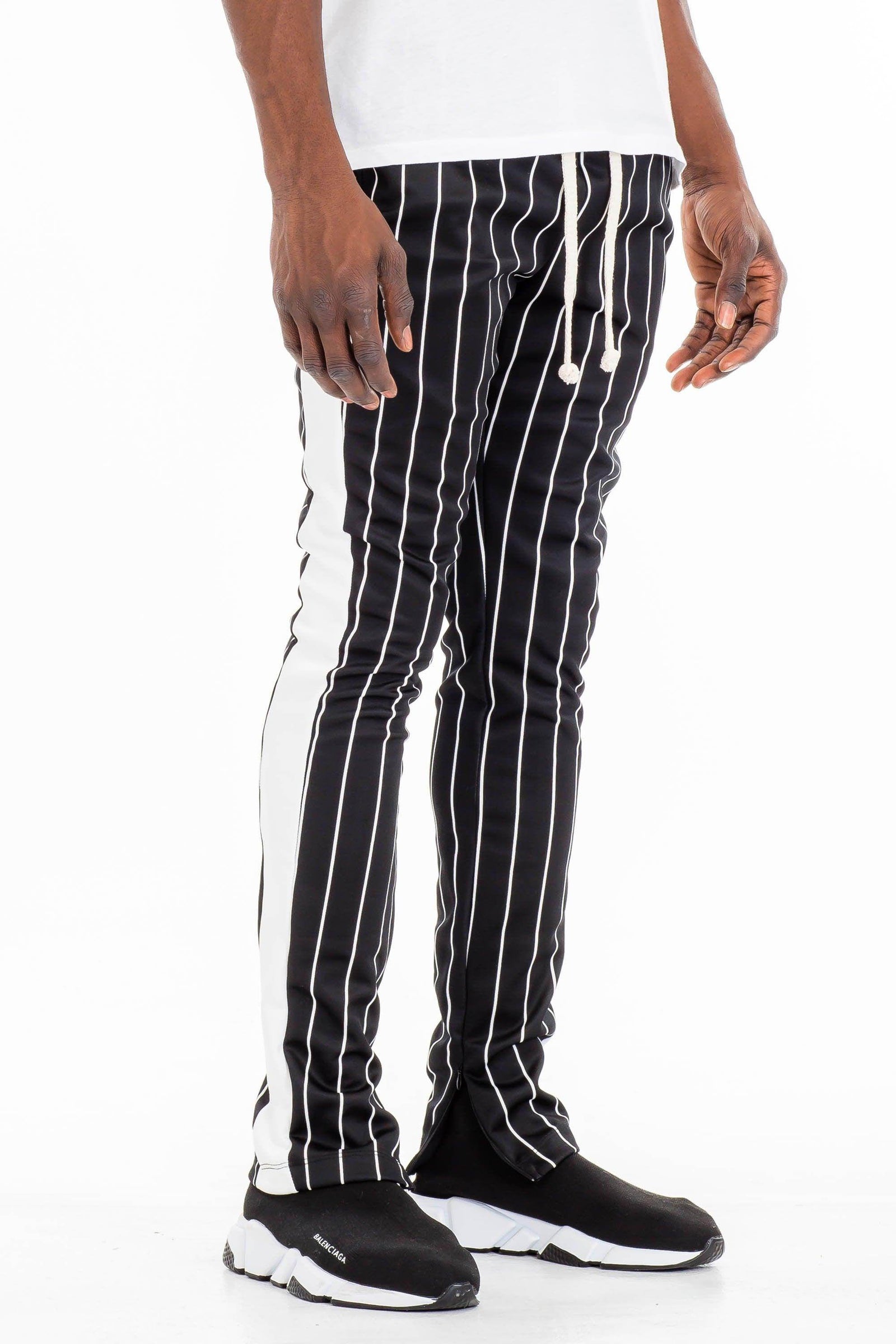 Men's VacationGrabs fashion track pants in black and white stripes for a stylish vacation look