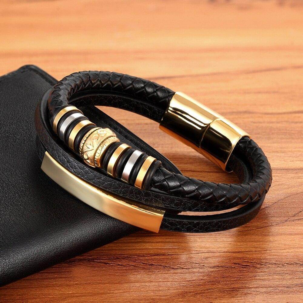 Stylish black leather fashion wristbands for men featuring golden accents and braided design