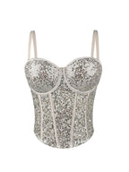 Silver fashionable clubwear sequin cami with adjustable straps and structured cups for a stylish night out