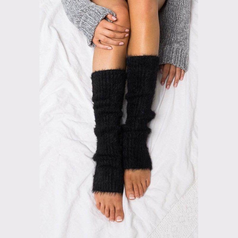 Stylish black fashionable leg accessories for women, perfect for adding warmth and flair