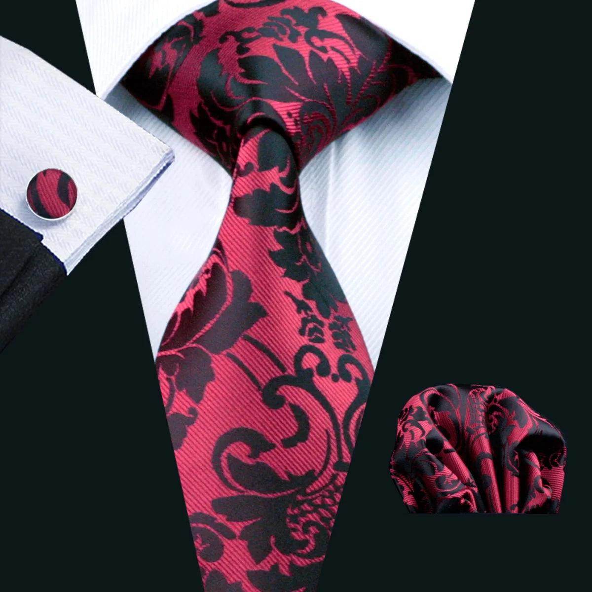 Fashionable silk tie sets featuring a stylish red and black floral design with matching pocket square