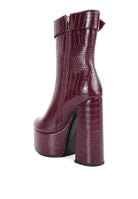 Stylish Rag Company fashionable vacation boots in burgundy with chunky heels and a modern design