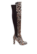 Leopard print knee-high boot with a high heel on a white background