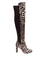 Leopard print knee-high boot with a high heel on a white background