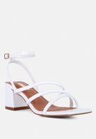White faux leather block heel sandals with adjustable ankle strap for stylish summer wear