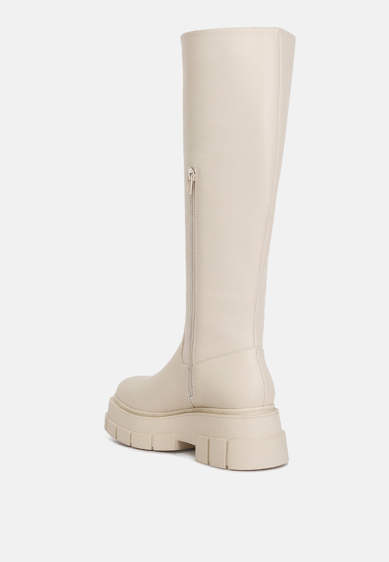 Cream faux leather platform knee boots with a side zipper and chunky sole for stylish comfort