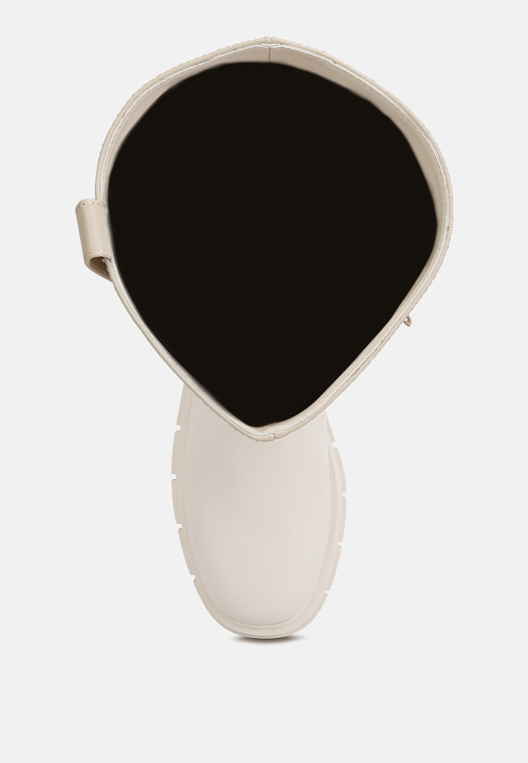 Top view of London Rag International faux leather platform knee boots in beige with a stylish design