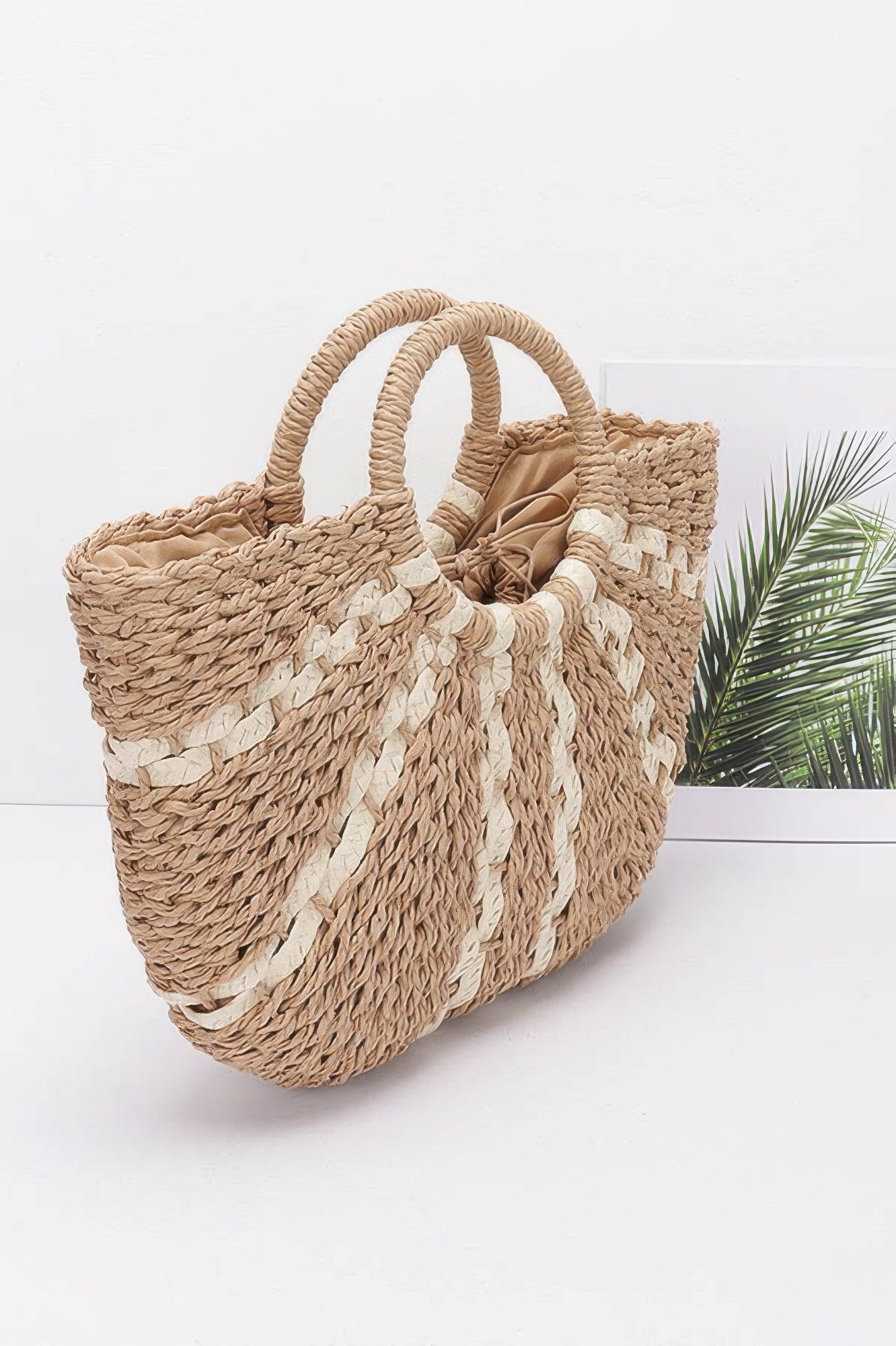 VacationGrabs faux straw tote bag with woven design and spacious interior for stylish outings