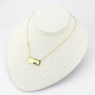 Flash gold brass necklace with a rectangular pendant for stylish women