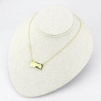 Flash gold brass necklace with a rectangular pendant for stylish women