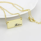 Elegant flash gold brass necklace featuring a rectangular pendant with 'Believe' engraving