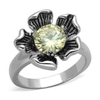 Floral citrine ring featuring a large yellow stone set in a stylish silver band