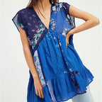 Women's blue floral dress with flowy design, perfect for summer outings