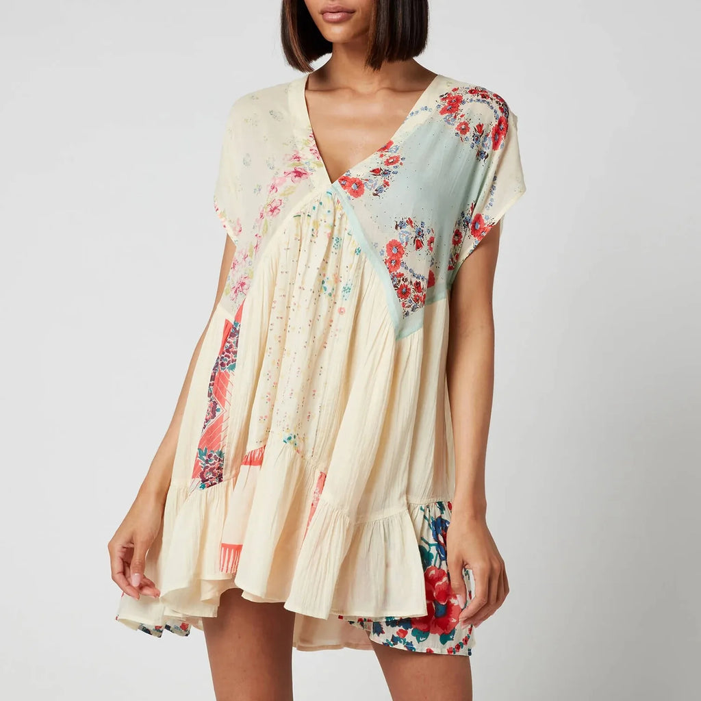 Women's floral dress dress in cream with pastel floral patterns, perfect for summer outings