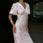 Floral dress dress in soft pink with delicate puff sleeves for casual outings