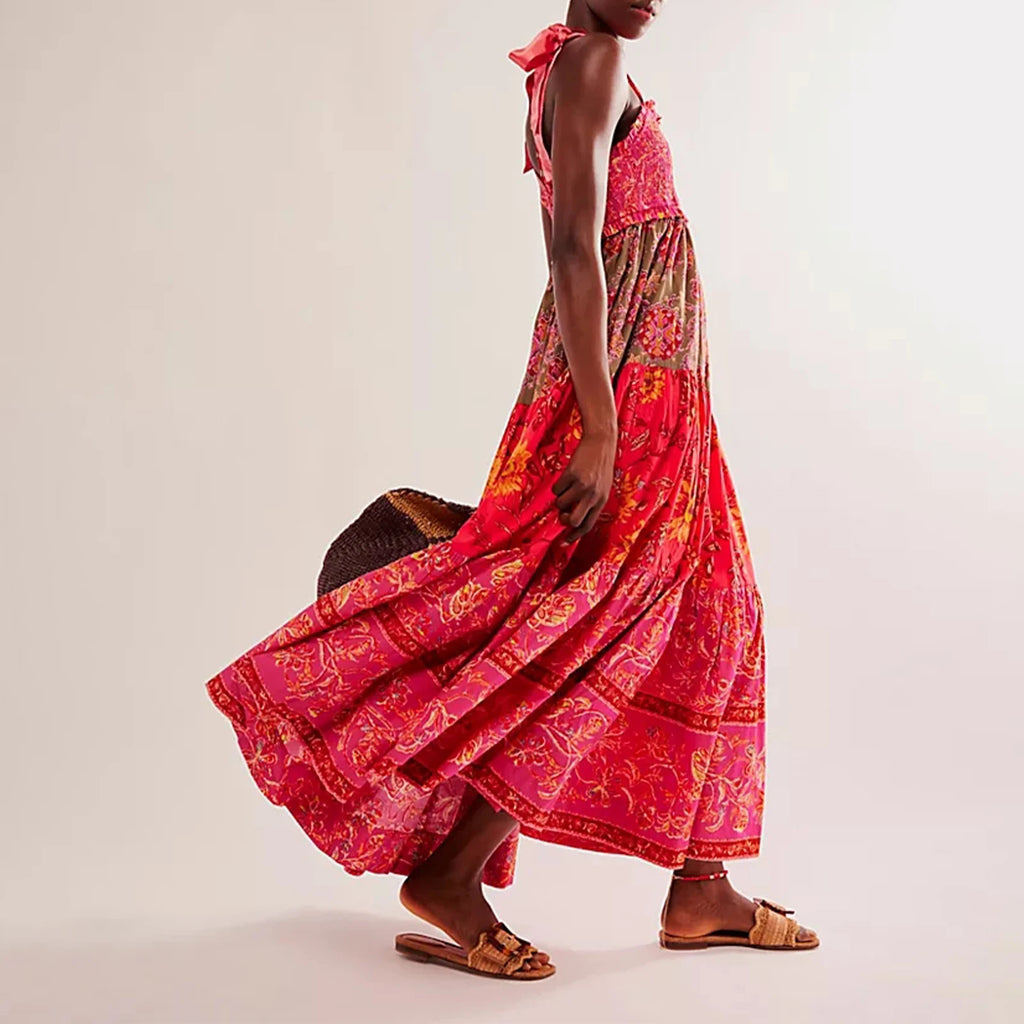 Women's floral dress in pink, perfect for summer vacations and outdoor events