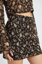 Emory Park floral lace skirt outfit with a dark floral pattern, perfect for casual or dressy occasions