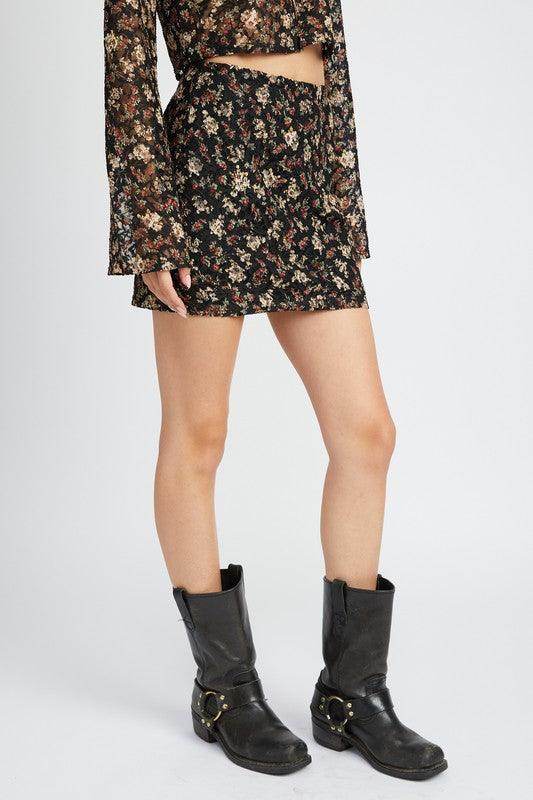 Emory Park floral lace skirt outfit featuring a patterned mini skirt styled with black boots