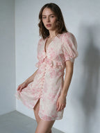 Floral mini dress with puff sleeves and buttons, perfect for summer outings