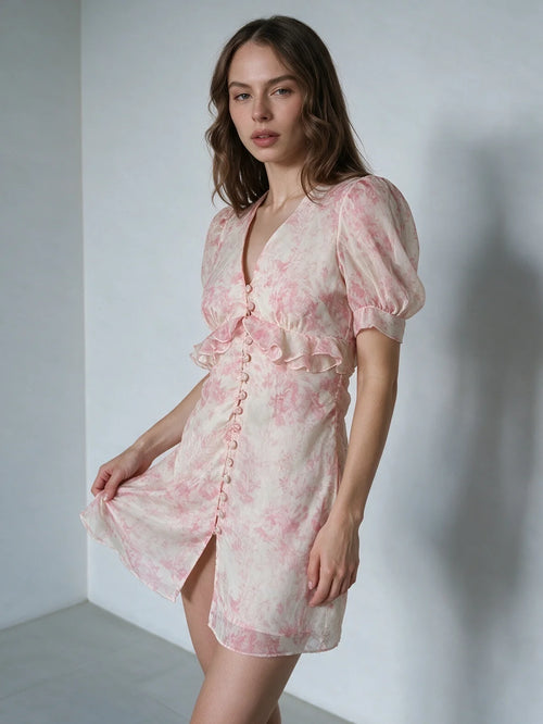 Floral mini dress with puff sleeves and buttons, perfect for summer outings