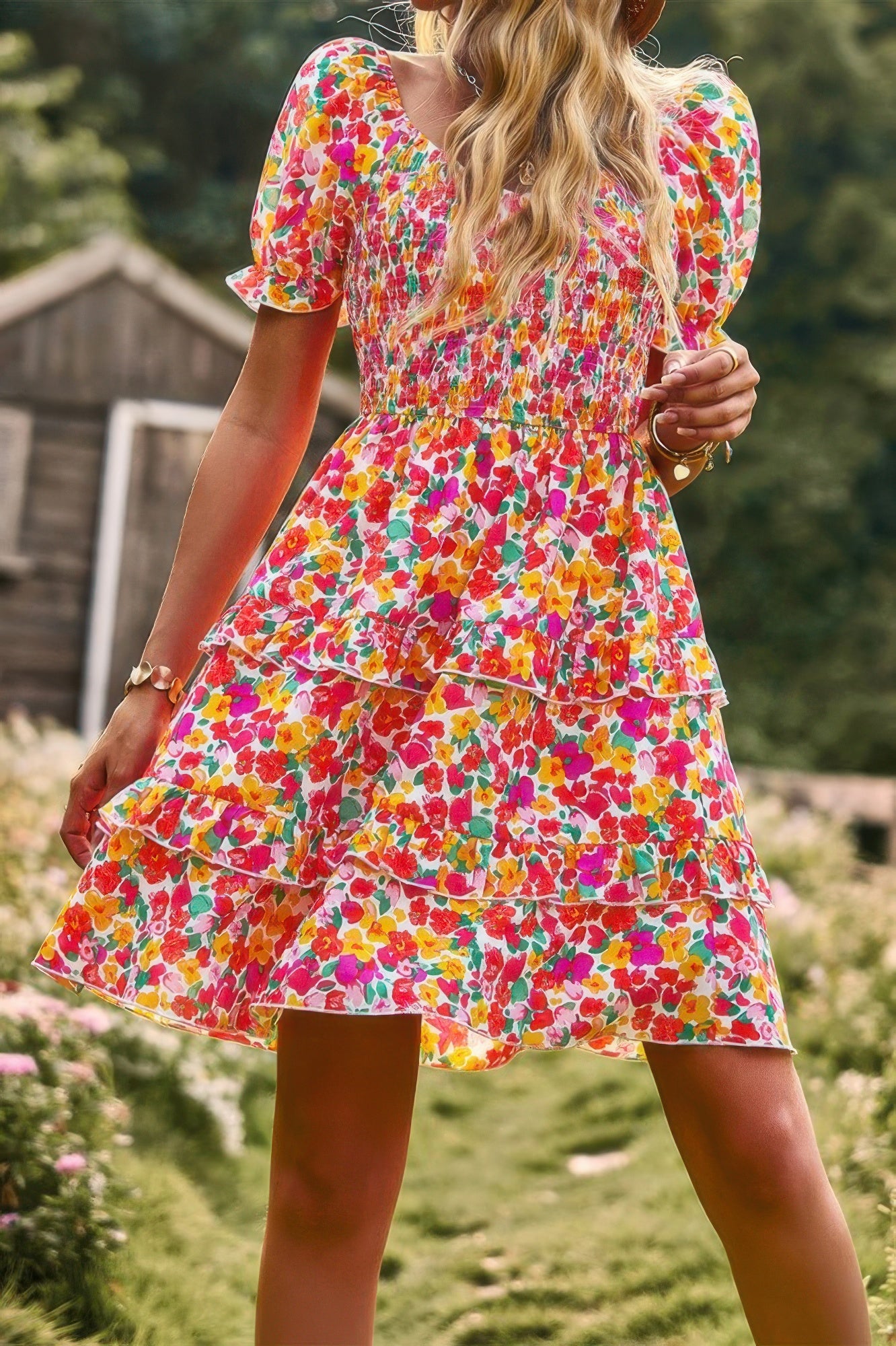 Colorful floral print a line dress with puff sleeves and tiered ruffles for a summer look