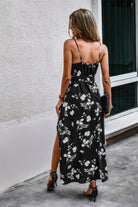 Elegant floral wrap cami dress with side slit and adjustable straps, perfect for summer outings