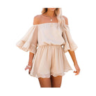 Beautiful flounce bell sleeve summer romper in a soft beige color perfect for beach days